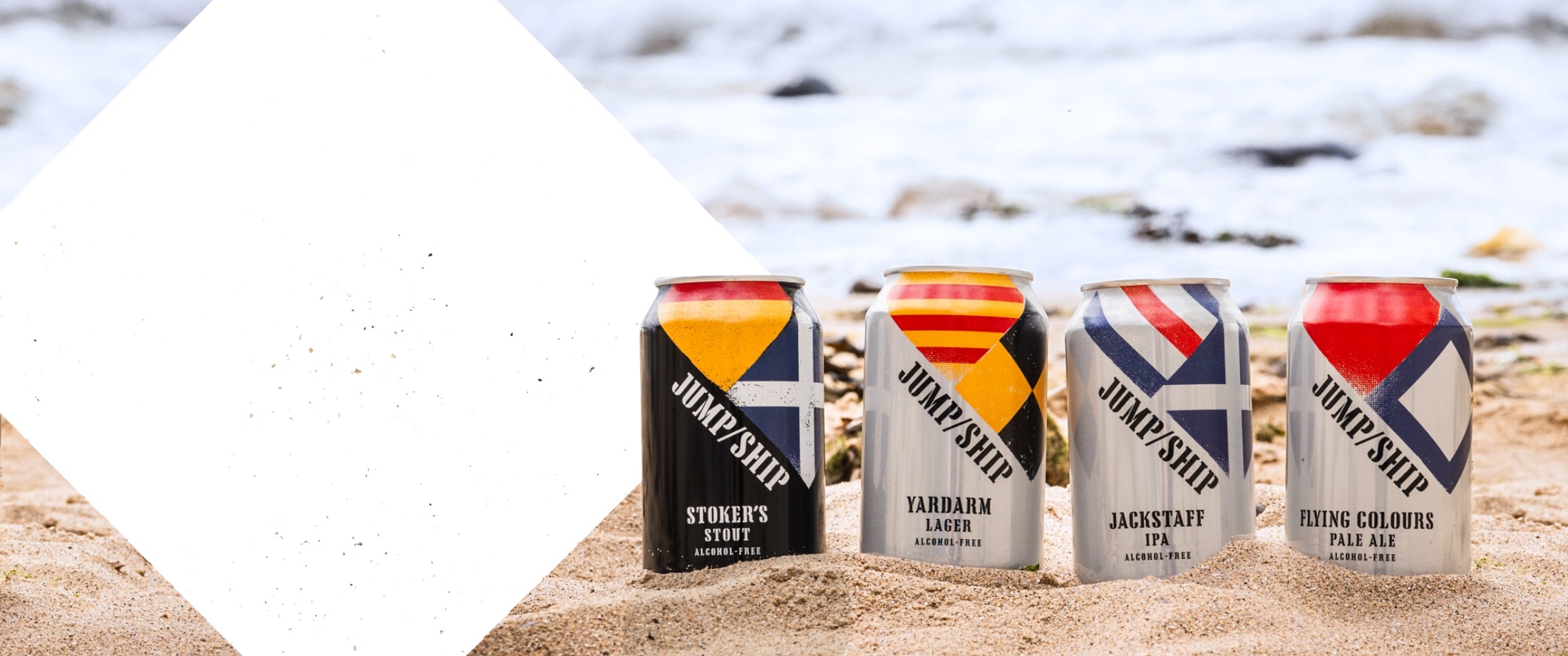 Jump Ship alcohol free beer cans on a beach setting with a white graphic of a diamond