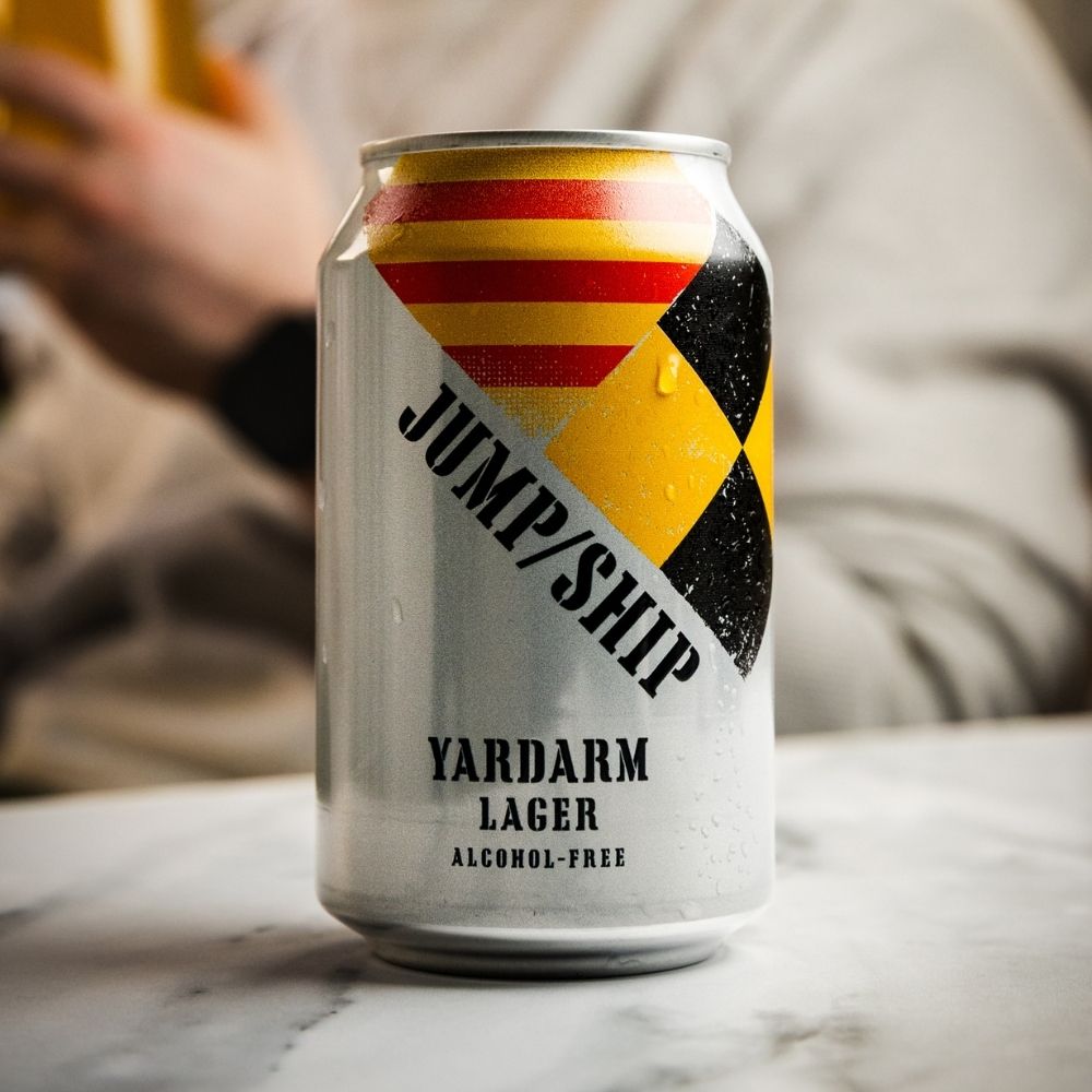 Can of Yardarm Lager on a marble surface