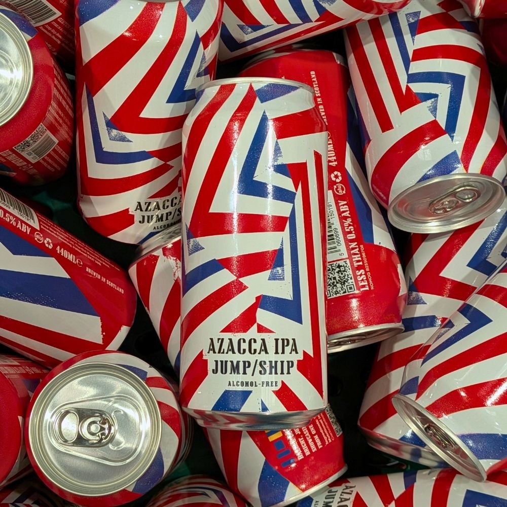 A pile of cans of Dazzle Ship Azacca non-alcoholic IPA