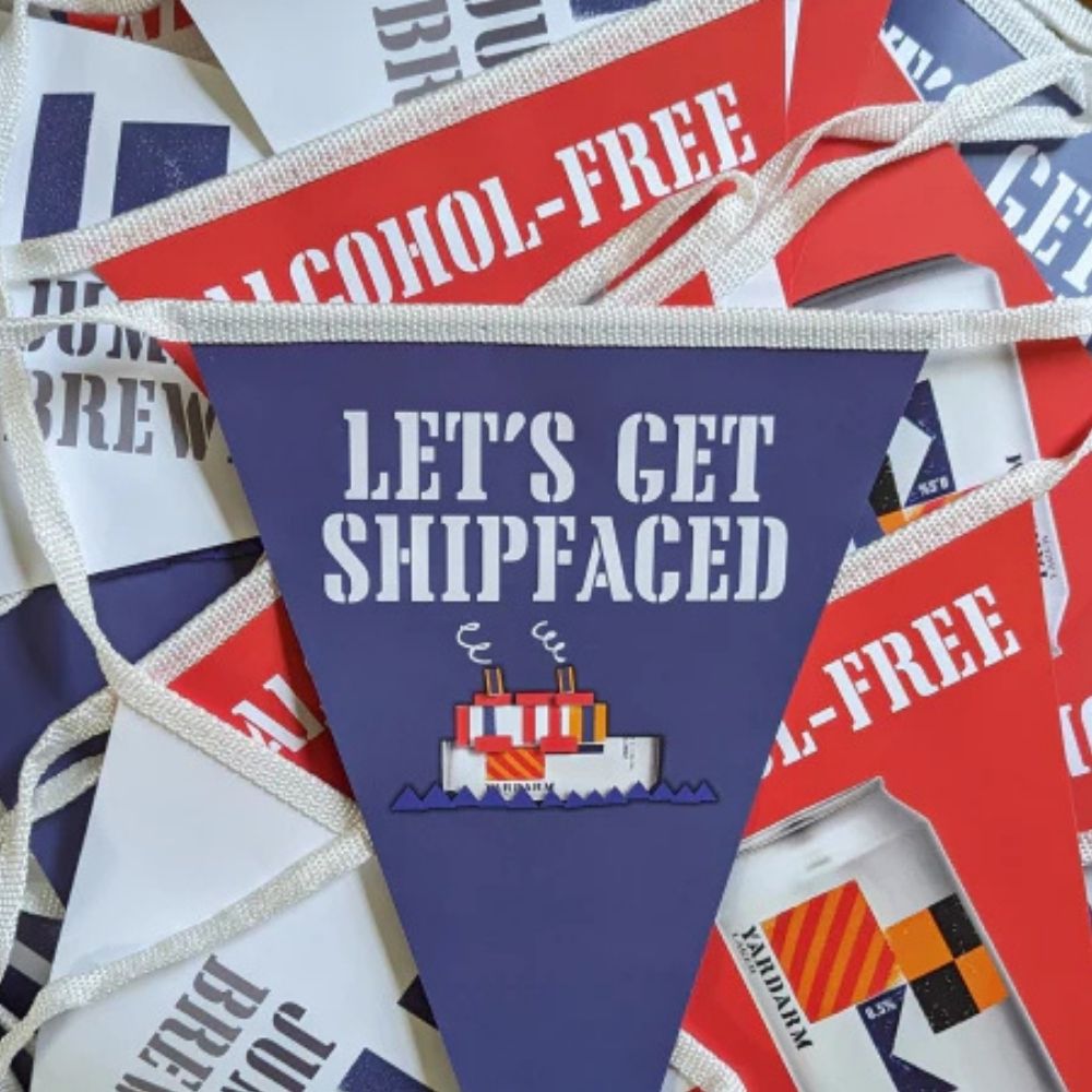 Bunting flag with 'Let's Get Shipfaced' text and ship graphic on a colorful background