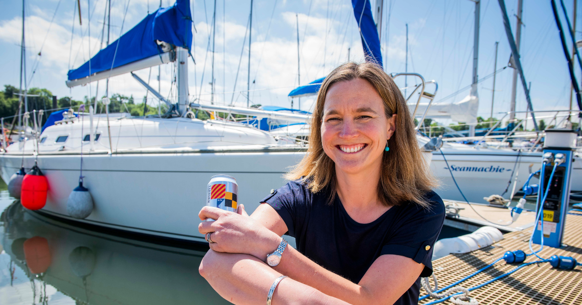 Sonja Mitchell sat with a can of Yardarm alcohol free lager in a harbour