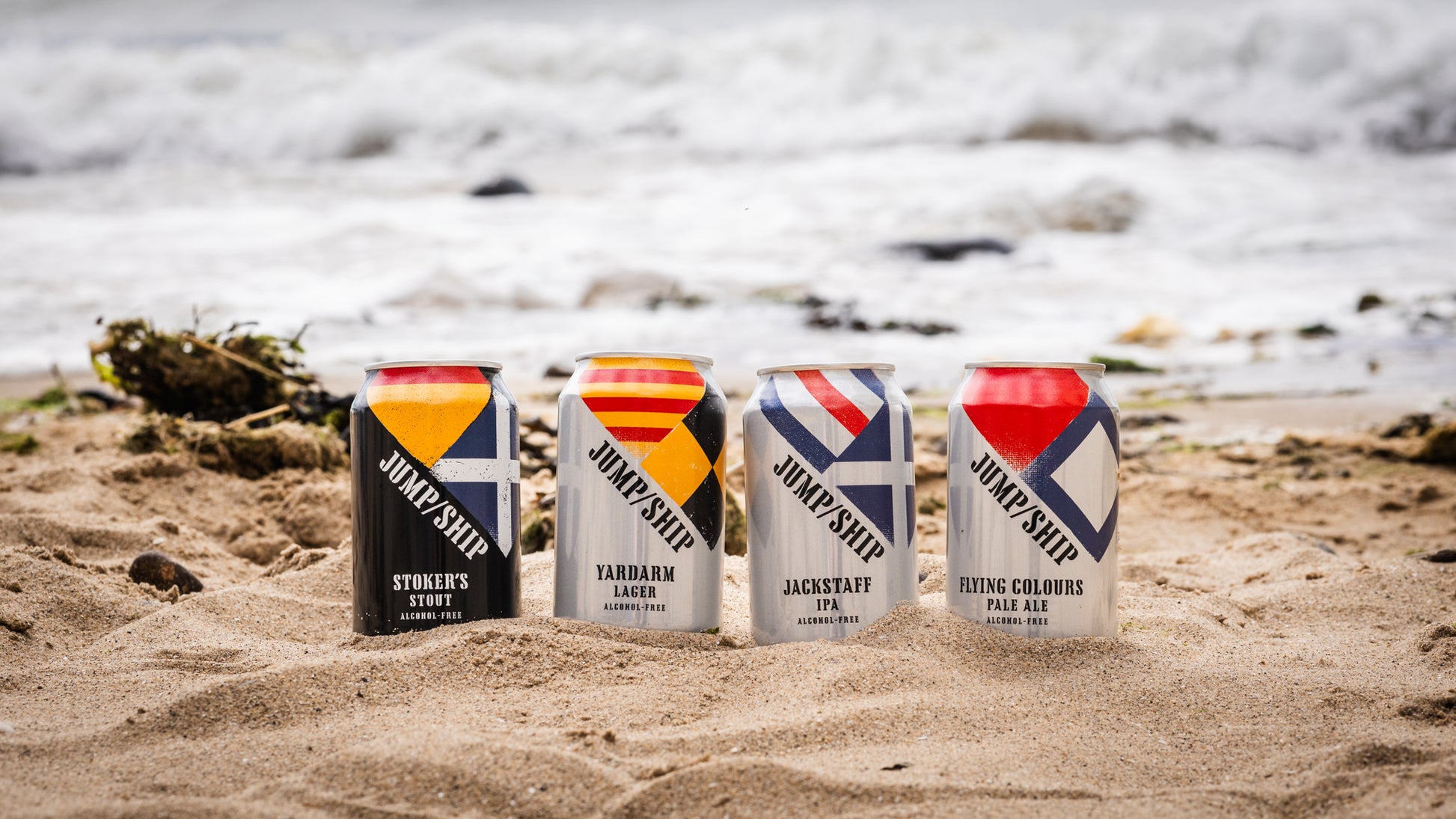 Alcohol free beer mixed pack cans front side on beach